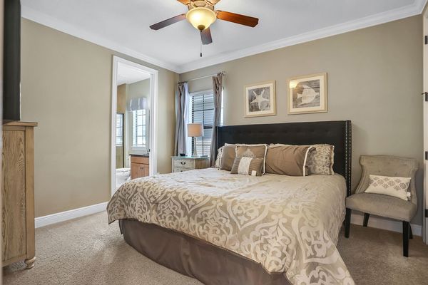 Master bedroom with a king sized bed and en-suite located on the 2nd floor