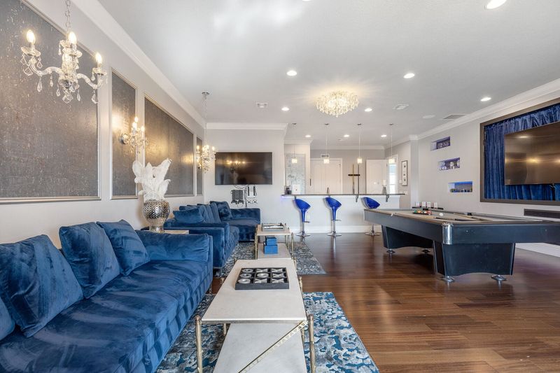 Watch any show or movie on these 4 65-SMART TVs upstairs in the entertainment loft (Disclaimer: Fireplace(s) not allowed for guest use, homeowner use only.)