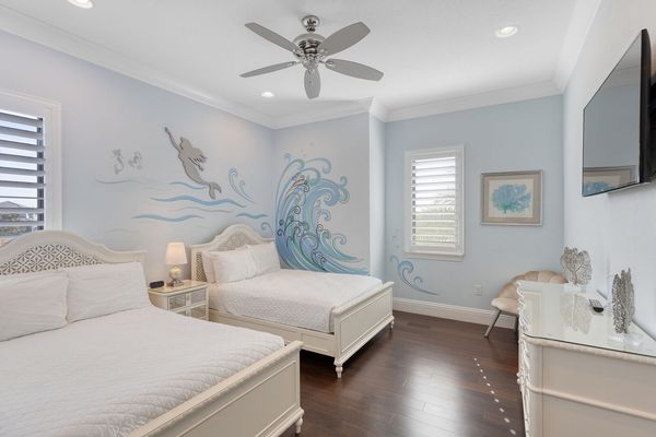 The Mermaids Suite features two full beds and en-suite bathroom