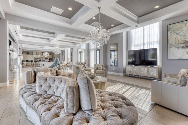 Gather around the living room area featuring a 85-inch 4K SMART TV with Bose sound bar