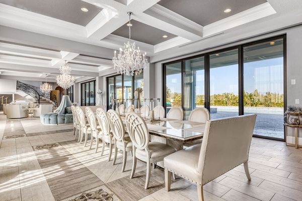 The dining table can seat up to 20 guests and 27 with bar stools