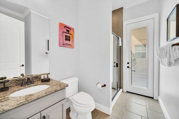 Downstairs family bathroom connecting to King Room, living room, and outside