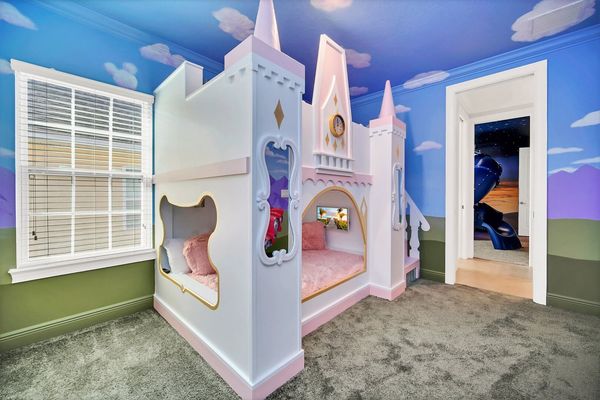 The kids will love this princess themed room with a full/full bunk bed.