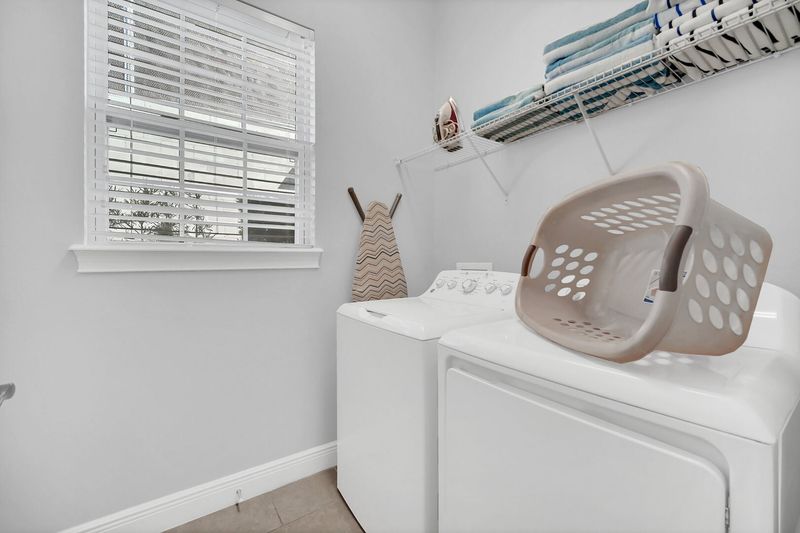 Downstairs laundry room for your convenience