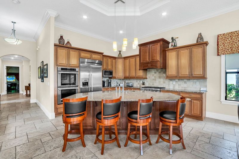 Gourmet kitchen boasting top of the line appliances