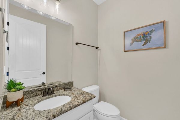 A half bath is located by the loft area