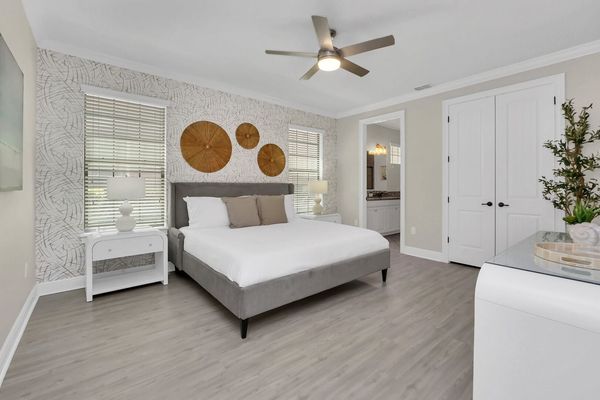 The master suite located on the ground floor features a king bed and en-suite bathroom