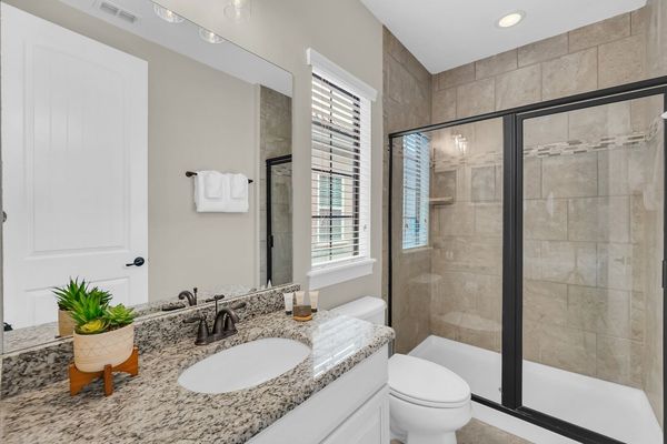 The king room features their own en-suite with a walk in shower