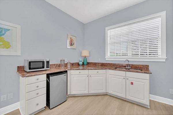 Complete with a mini-fridge, microwave and sink so you don`t have to go all the way to the kitchen for a midnight snack