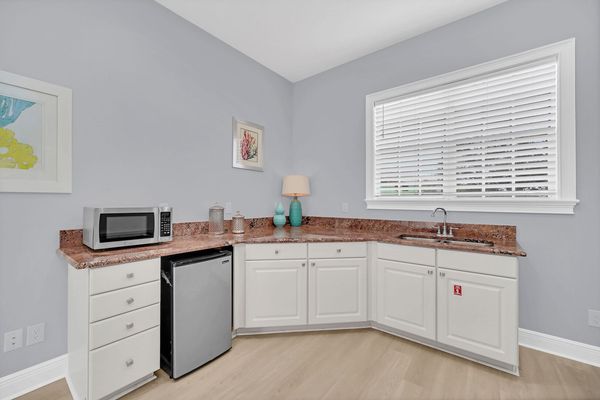 Complete with a mini-fridge, microwave and sink so you don`t have to go all the way to the kitchen for a midnight snack