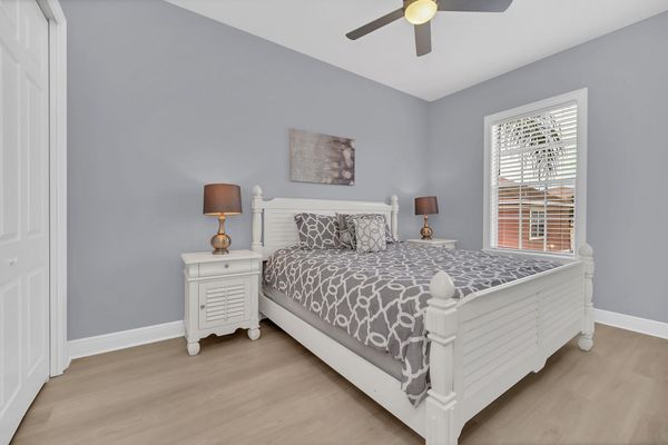 This upstairs bedroom features a King bed