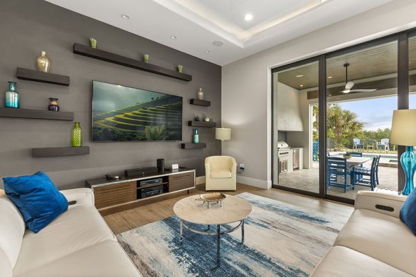 The open floorplan and large sliding glassdoors provide you great views