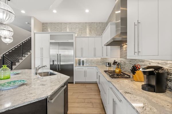 The kitchen has stainless steel appliances