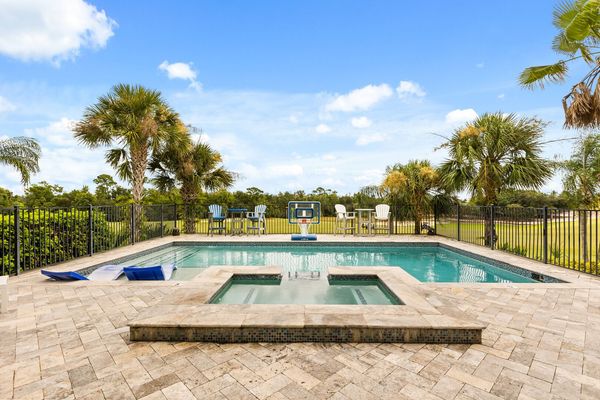 Lounge by your private pool anytime