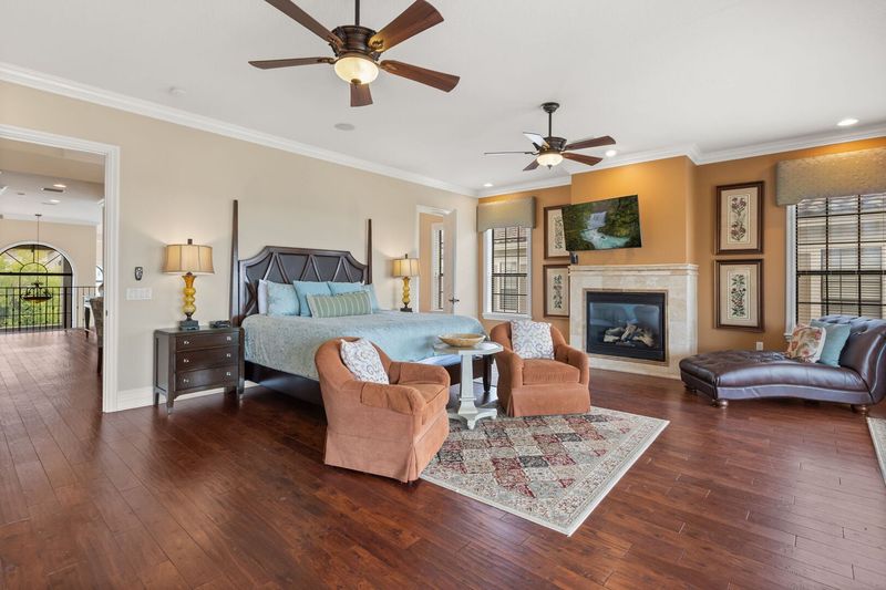 Spacious upstairs master suite bedroom 1 (Fireplace not allowed for guest use)