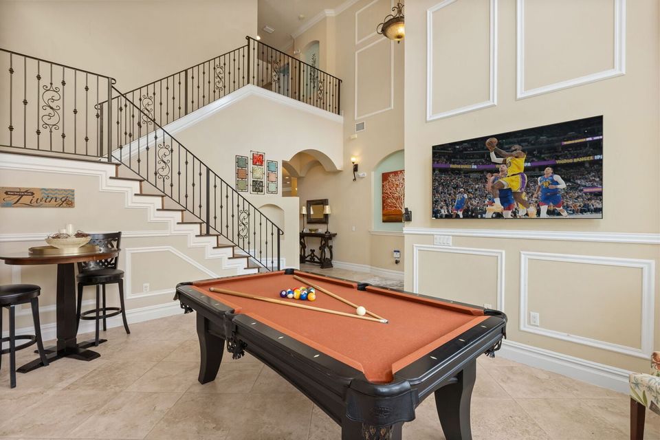 Shoot pool or watch the big game in your own billiard room