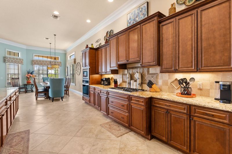 Unleash your inner chef in this fantastic kitchen featuring high end appliances and granite countertops