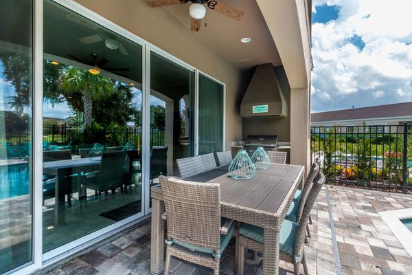 An outdoor dining table for 8 to enjoy meals straight off the barbecue