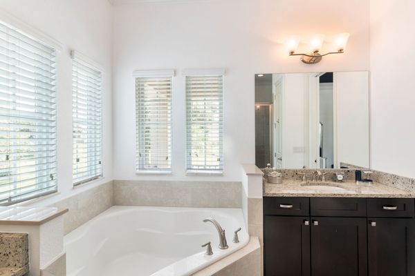Two sinks and a luxurious tub to soak in