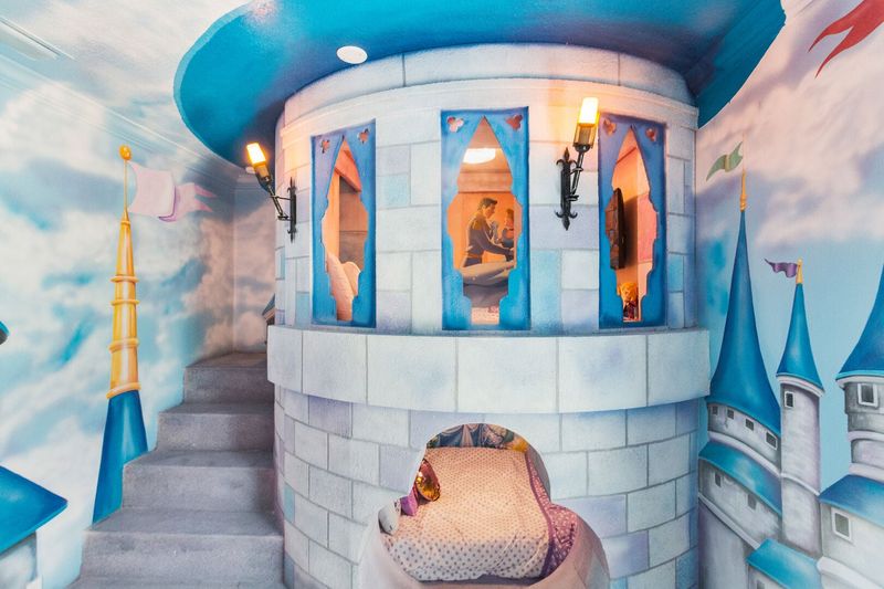 A magical castle awaits princesses in this amazing custom built full over full bed