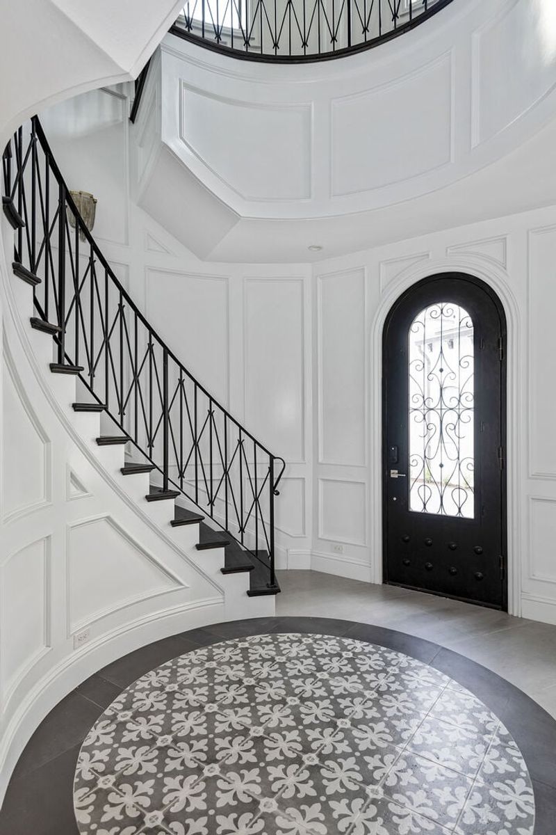 The best place to make a royal entrance to the Chateau featuring a spiral staircase