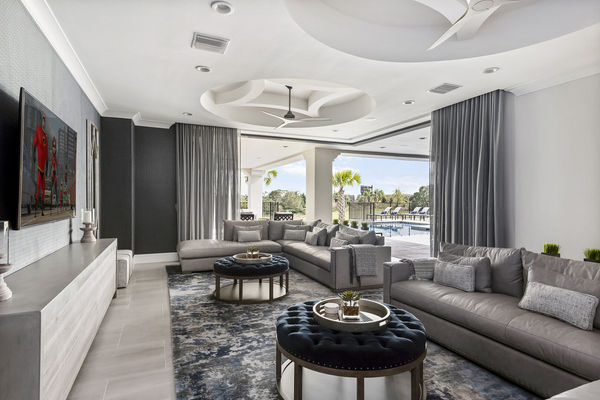 Watch a show on the 74 inch HD 4K SMART TV while relaxing on luxurious leather sectional sofas
DISCLAIMER: the patio doors cannot remain open.