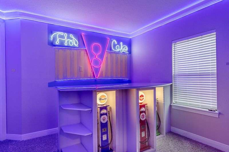 Enjoy a snack or a drink at this fun diner bar area.