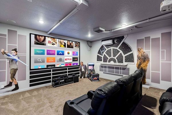 Head into the galactic theater and games room with theater seating for 7