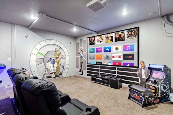 The whole family will love watching movies together in this custom theater