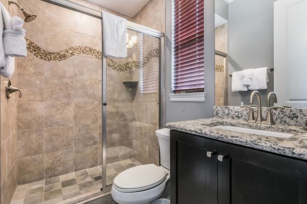 En-suite bathroom with glass door shower