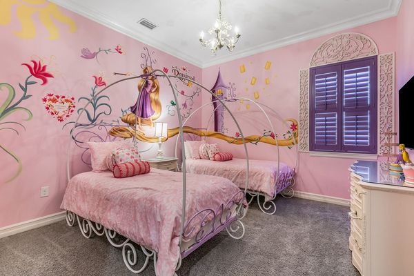 The princesses will love their custom bedroom with two twin beds