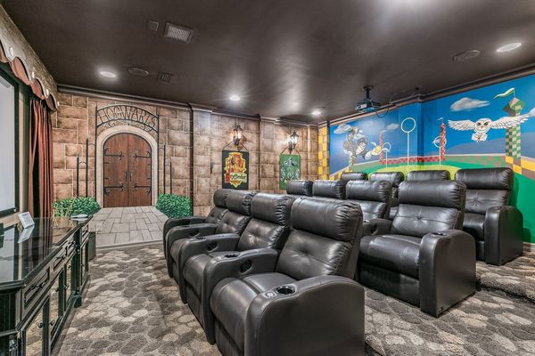 Enjoy your popcorn and movie in the leather recliner sofas seating for 12