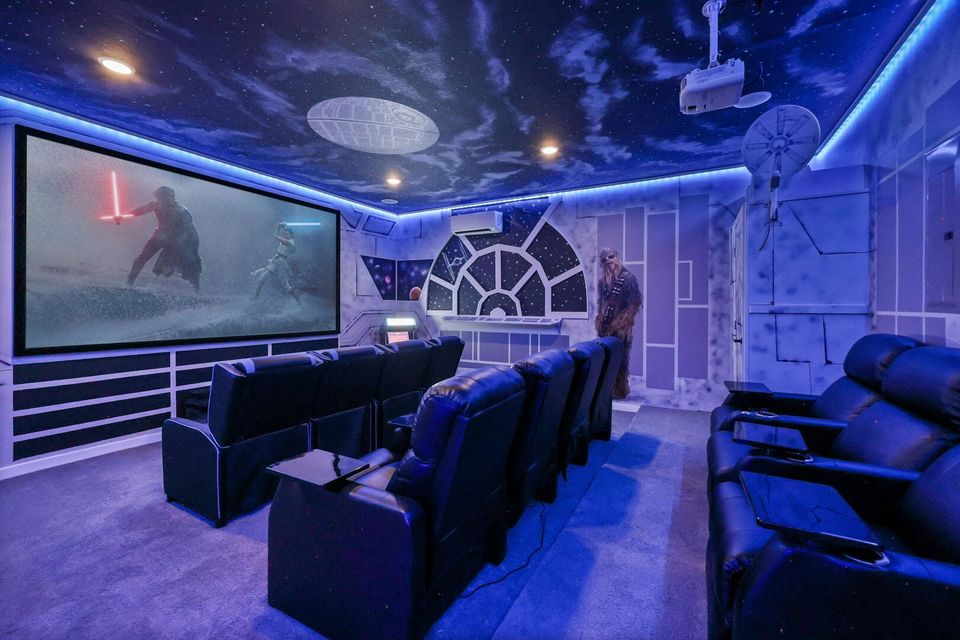 Head into the galactic theater and games room with theater seating for 11.