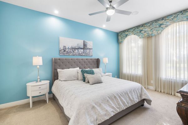 Downstairs bedroom features a king bed