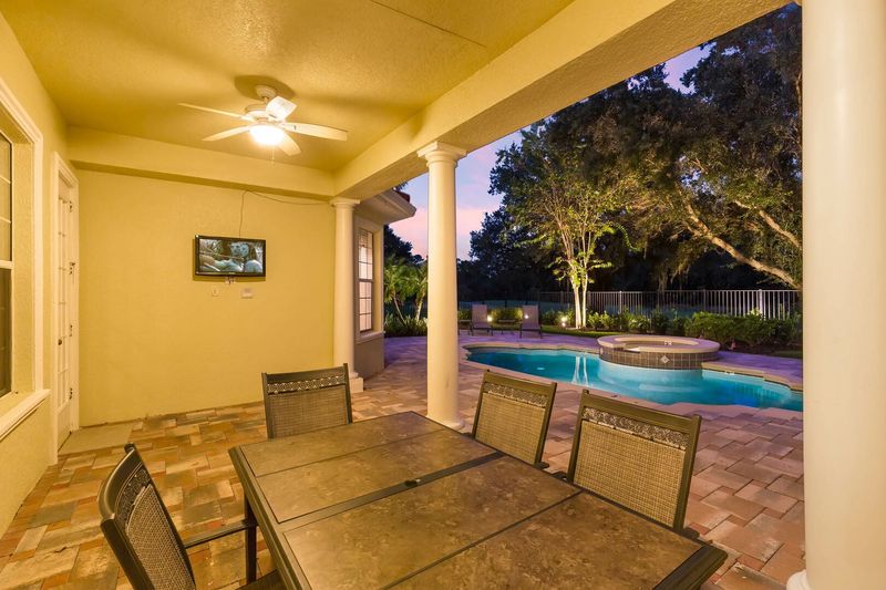 Dine al fresco underneath the covered lanai
