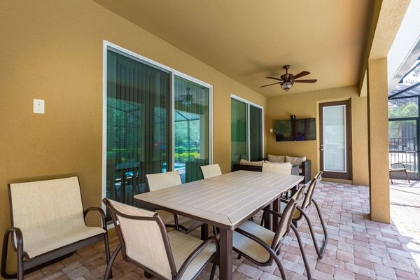 Dine al fresco underneath the covered lanai
