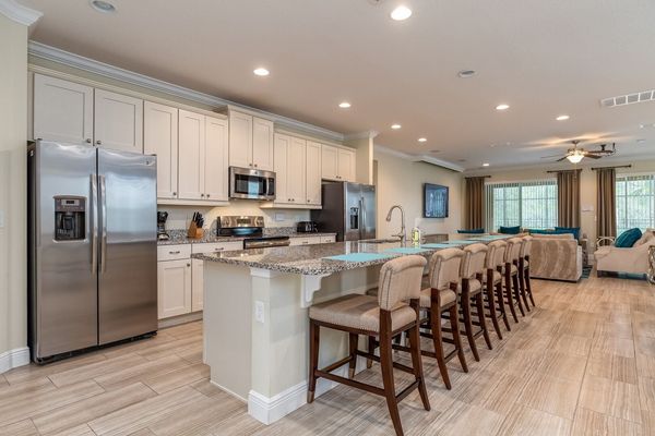 Eat a snack at the breakfast bar with seating for 6