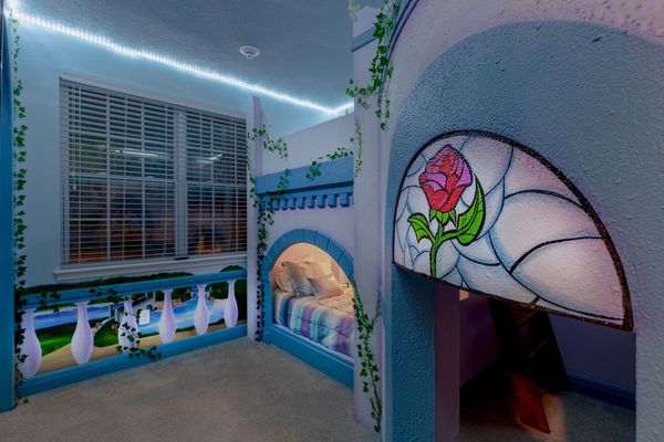 The bedroom features custom lights for magical evenings