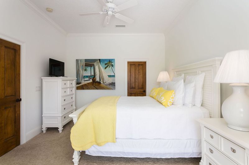 Beach theme bedroom with a Queen bed