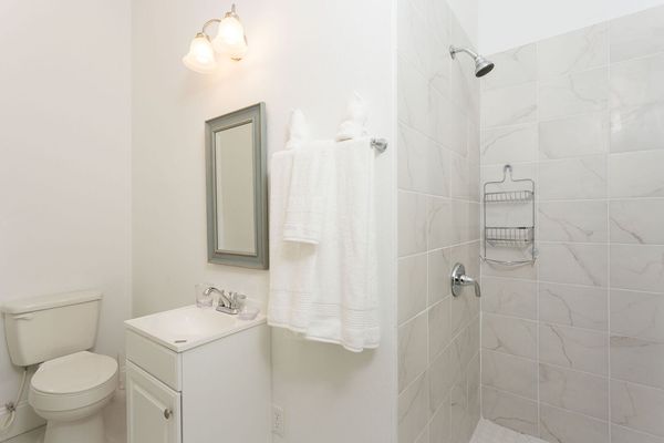 This ensuite master bathroom has a beautiful walkin shower
