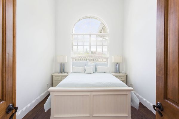 This classic downstairs bedroom is complete with a Queen bed