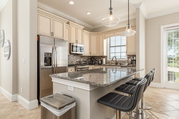 Enjoy a quick meal or snack at the breakfast bar with seating for 4