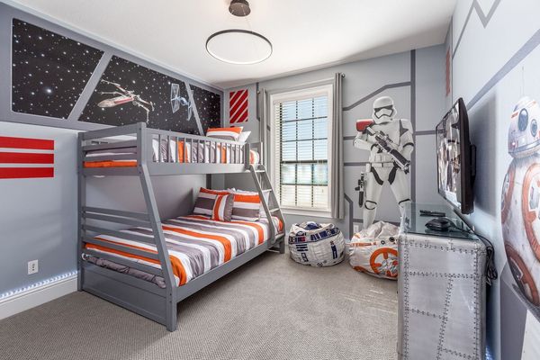 Kids will love this fun custom bedroom with a single over full bunk bed