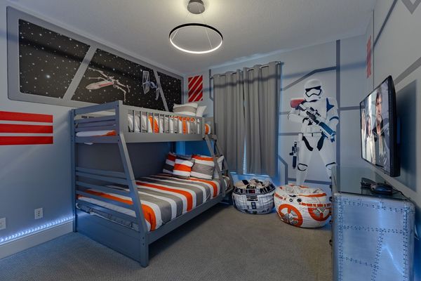 The galactic bedroom features awesome lights that give a cool effect to the whole room