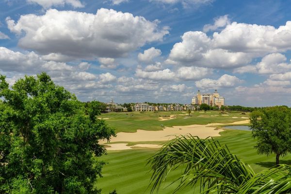 You can see the Reunion Grande and the golf course from your private balcony