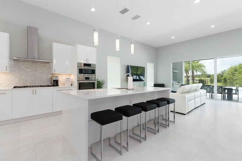 Enjoy a cup of coffee seated at the breakfast bar