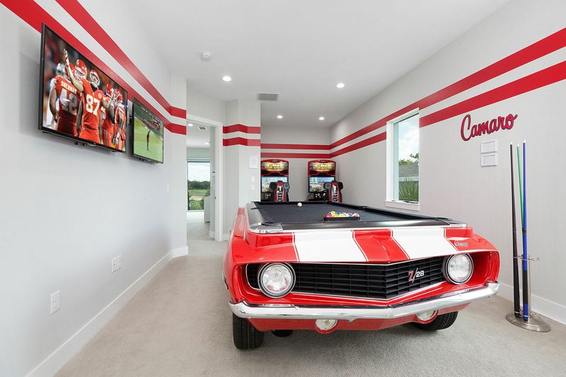 Play a round of pool on the custom built Camaro pool table