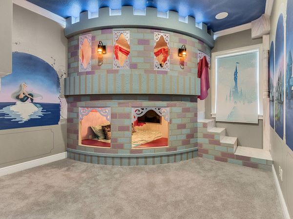 A magical castle awaits princesses in this amazing custom built full over full bed