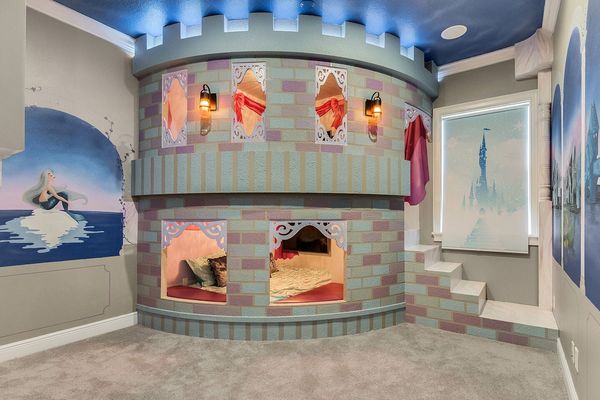 A magical castle awaits princesses in this amazing custom built full over full bed
