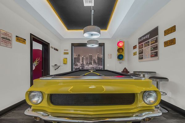 The pool table is an authentic Ford Mustang